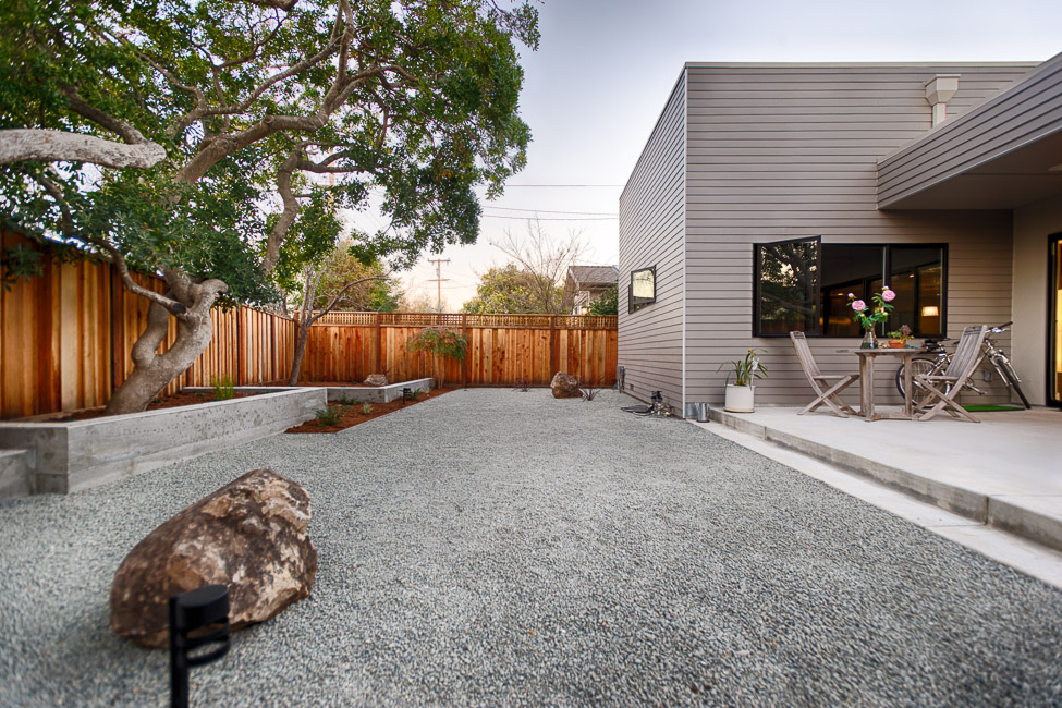  Backyard landscape, patio, and house 